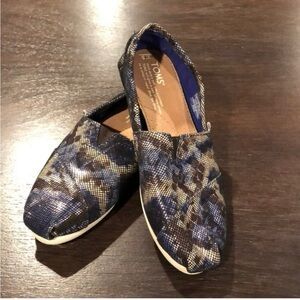 TOMS Black and Brown Patterned Slip-On Shoes